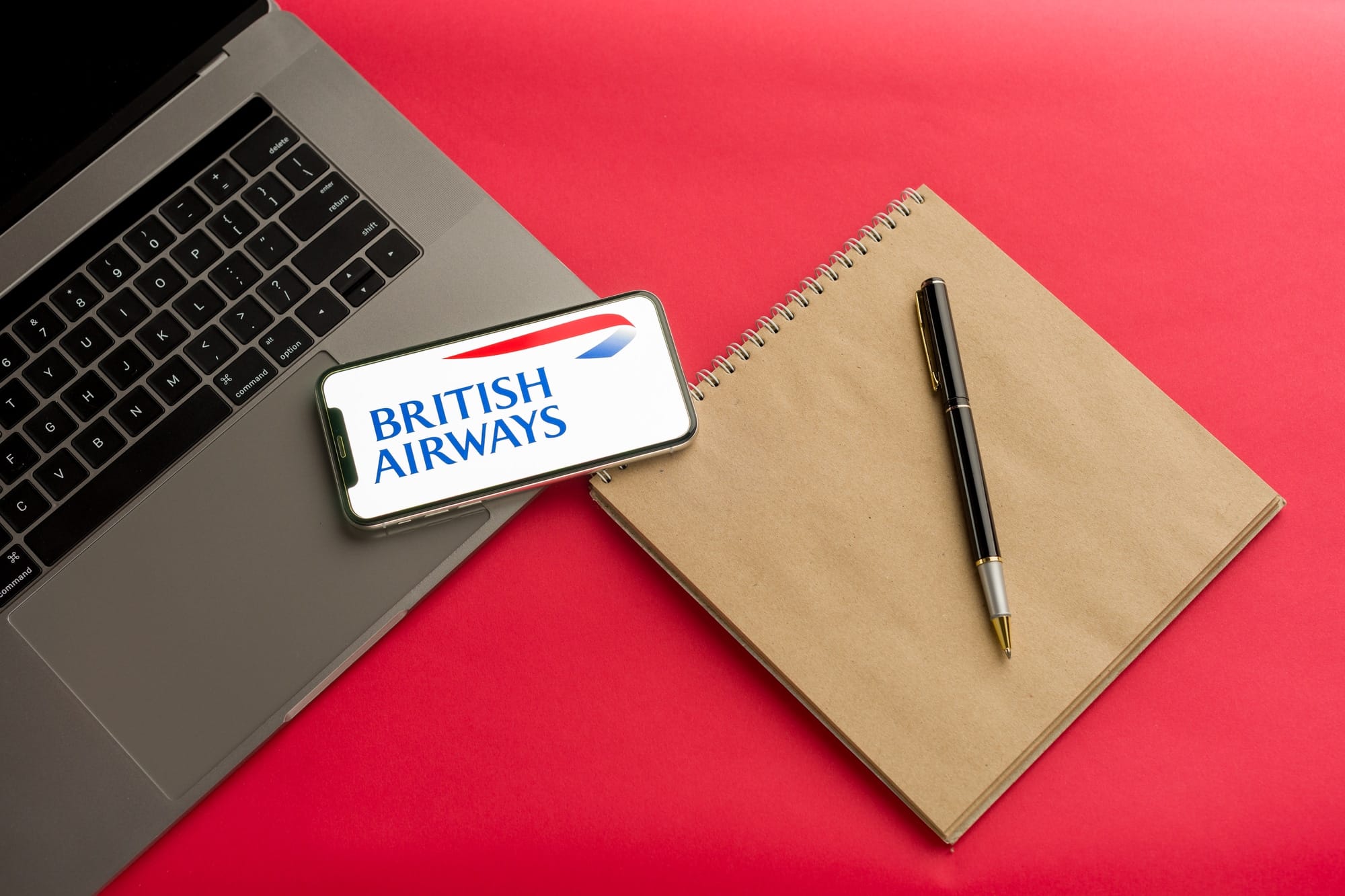 british-airways-swot-analysis-opportunities Logo British airways on a smartphone near modern laptop on red background