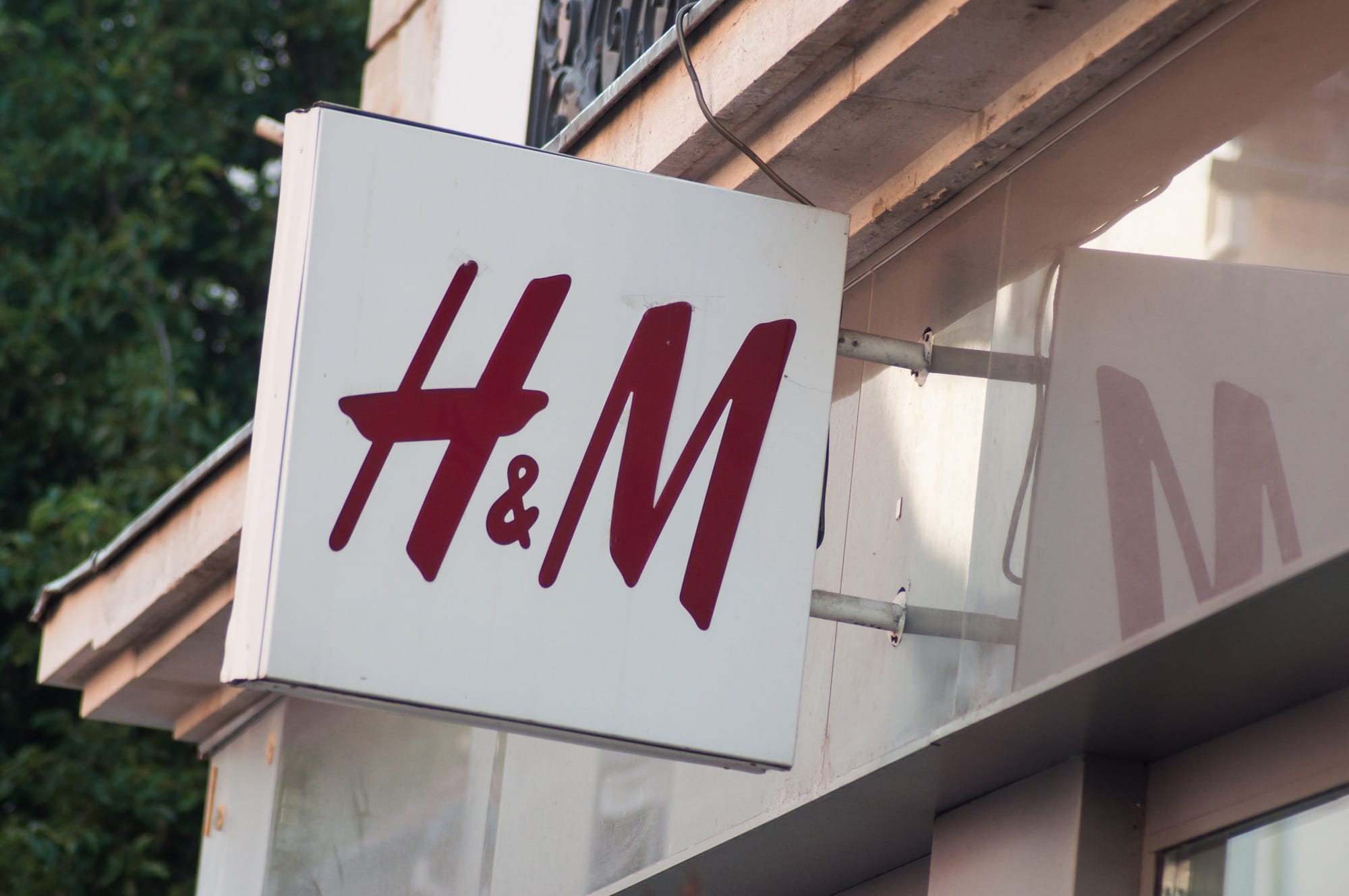 hm-swot-analysis-threats Mulhouse - France - 25 August 2019 - Closeup of H&M logo on stor